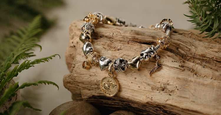 Evolve New Zealand inspired charms for charm bracelets in gold silver enamel murano glass pounamu greenstone and paua.  Search all the whole collection