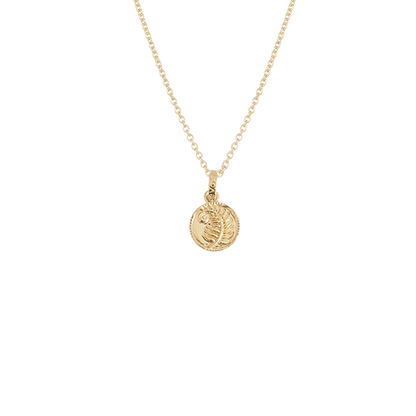 Gold necklace with a round fern pendant