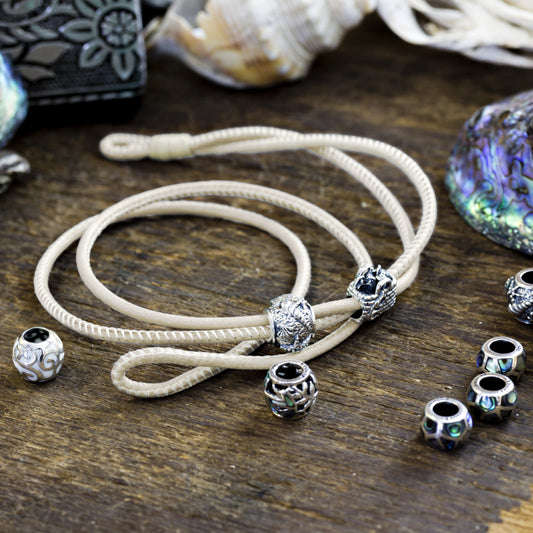 Cream Safe Travel wrap with charms