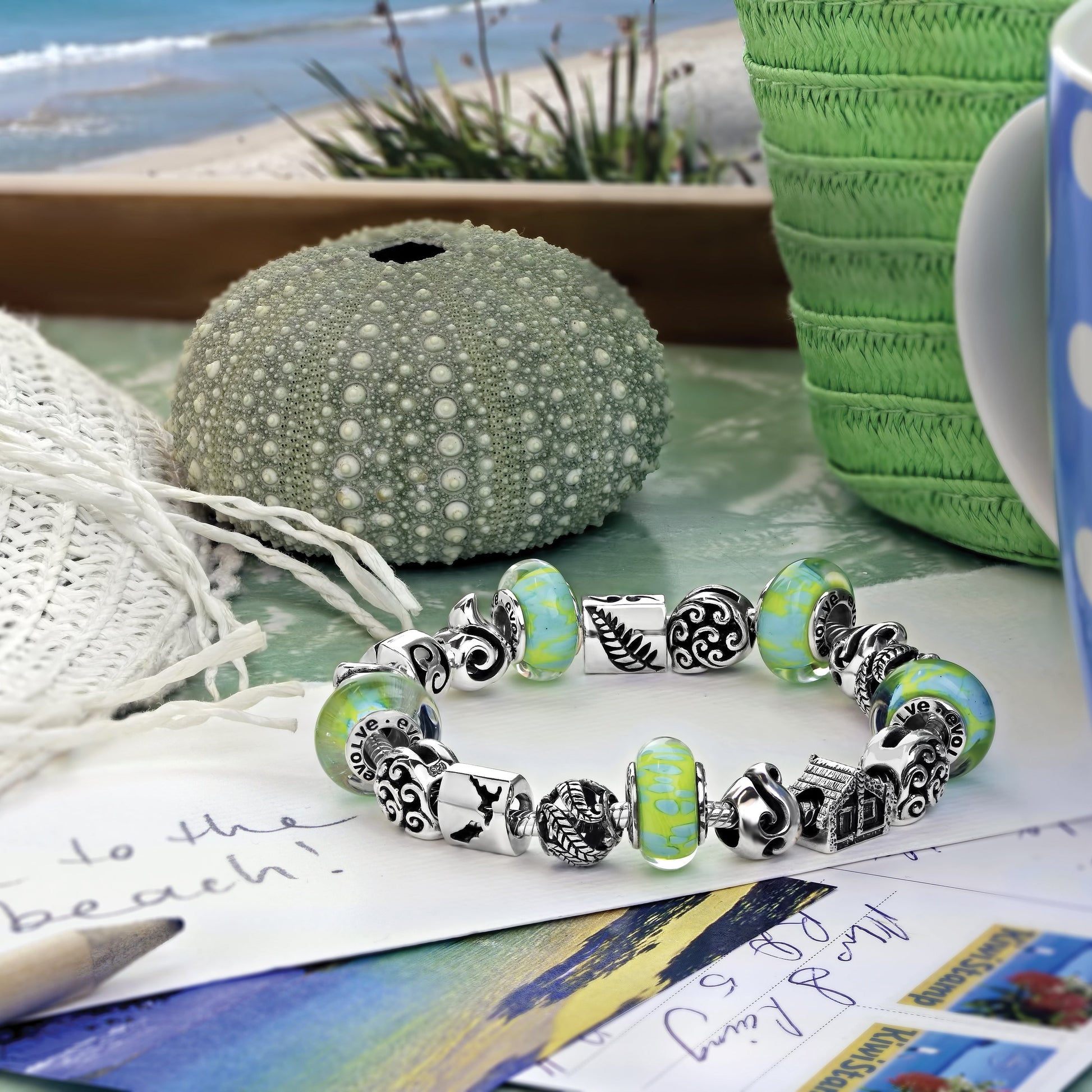 Summer Bach with Coromandel charm bracelet